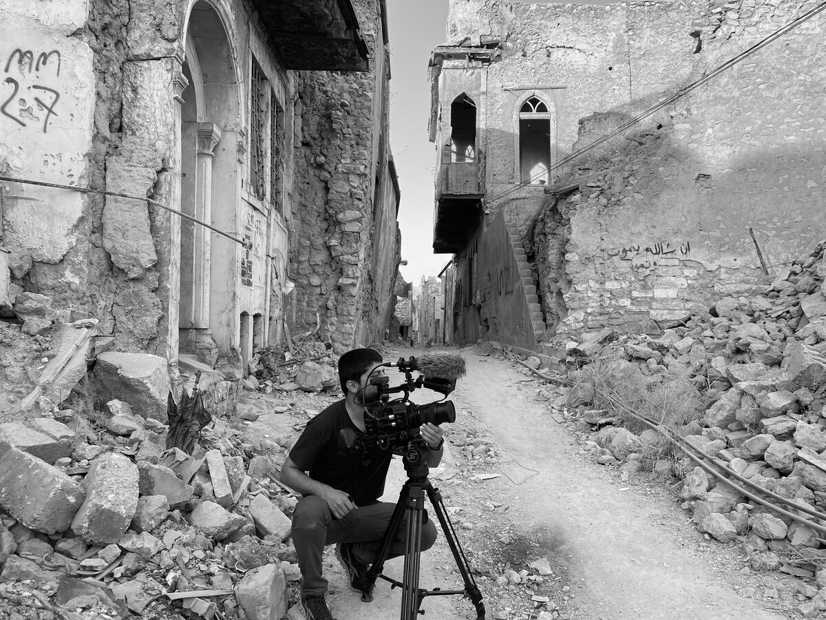 Camera on tripod overlooking the Tigris river at dusk